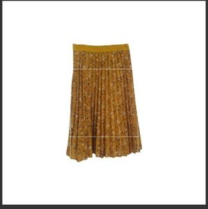 Yellow pleaded Mid-length skirt